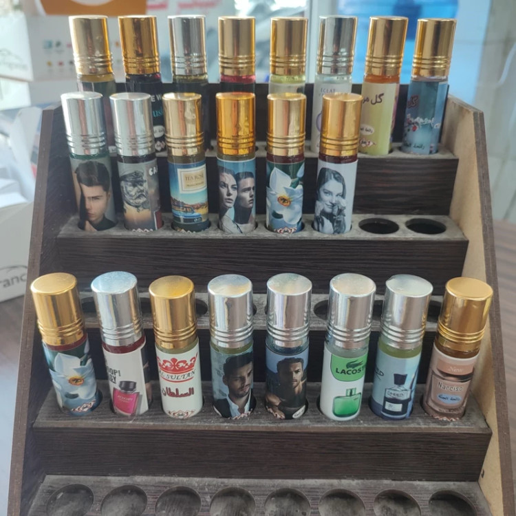 عطر 6 گرمی با رایحه های مختلف پخش بوی و ماندگاری بالا