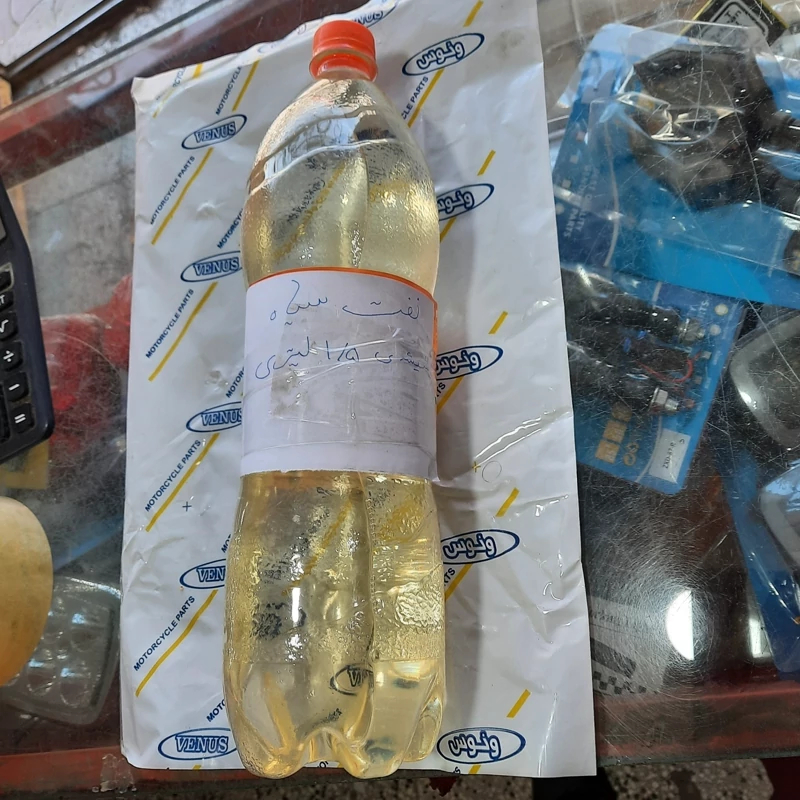 نفت سیاه شیشه 1/5لیتری
