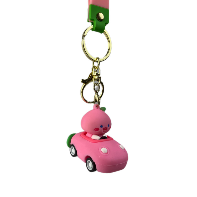 جاسوییچی و جاکلیدی سیلیکونی و ماشین عقب کش طرح Peach Family صورتی