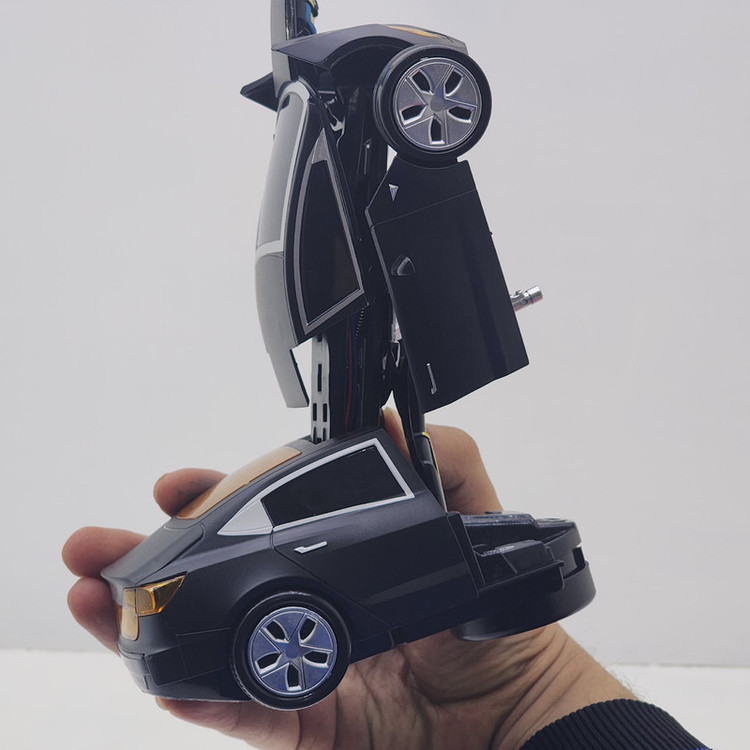ماشین بازی مدل موزیکال چراغ دار تبدیل شونده تسلا tesla 213